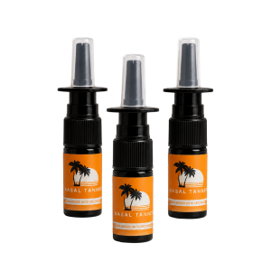 Three black nasal tanner spray bottles with orange labels.