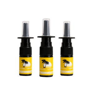 Three black and yellow nasal tanner spray bottles.